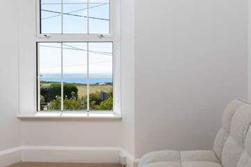 Perch here with morning coffee and let the views inspire the day's adventures from bedroom four.