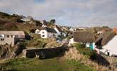 The historic fishing cove of Cadgwith is a hike down the coastal path or a short drive away.  - Thumbnail Image