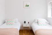Bedroom 2 on the ground floor is a twin and has its own en suite shower-room.