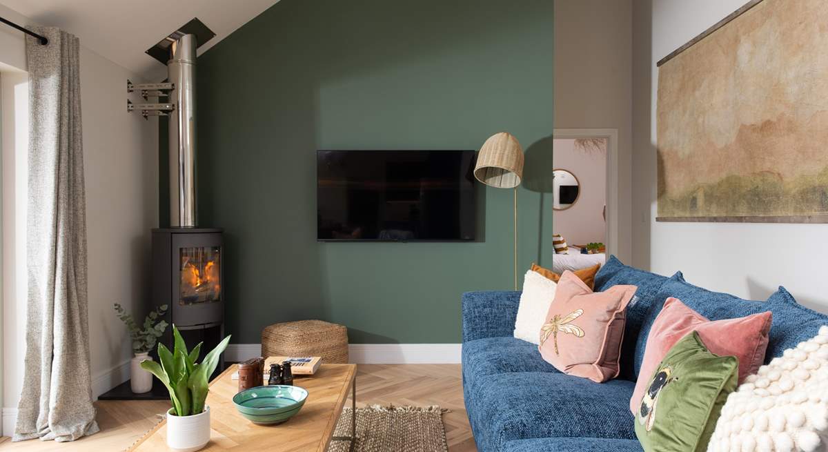 The toasty wood-burner is perfect for chillier days.