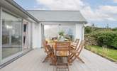 Dine in the best of the Cornish sunshine, with holiday meals on the large decking. - Thumbnail Image