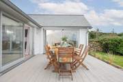 Dine in the best of the Cornish sunshine, with holiday meals on the large decking.