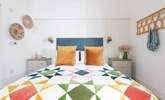 A gorgeous Oliver Bonas bedspread dresses the bed in the third bedroom. - Thumbnail Image