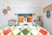 A gorgeous Oliver Bonas bedspread dresses the bed in the third bedroom.