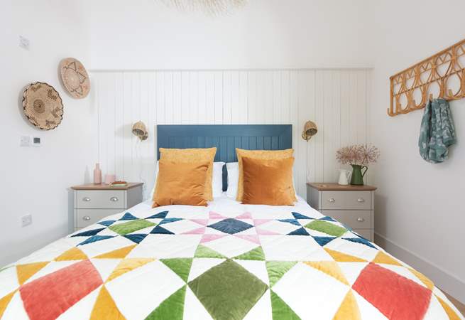 A gorgeous Oliver Bonas bedspread dresses the bed in the third bedroom.