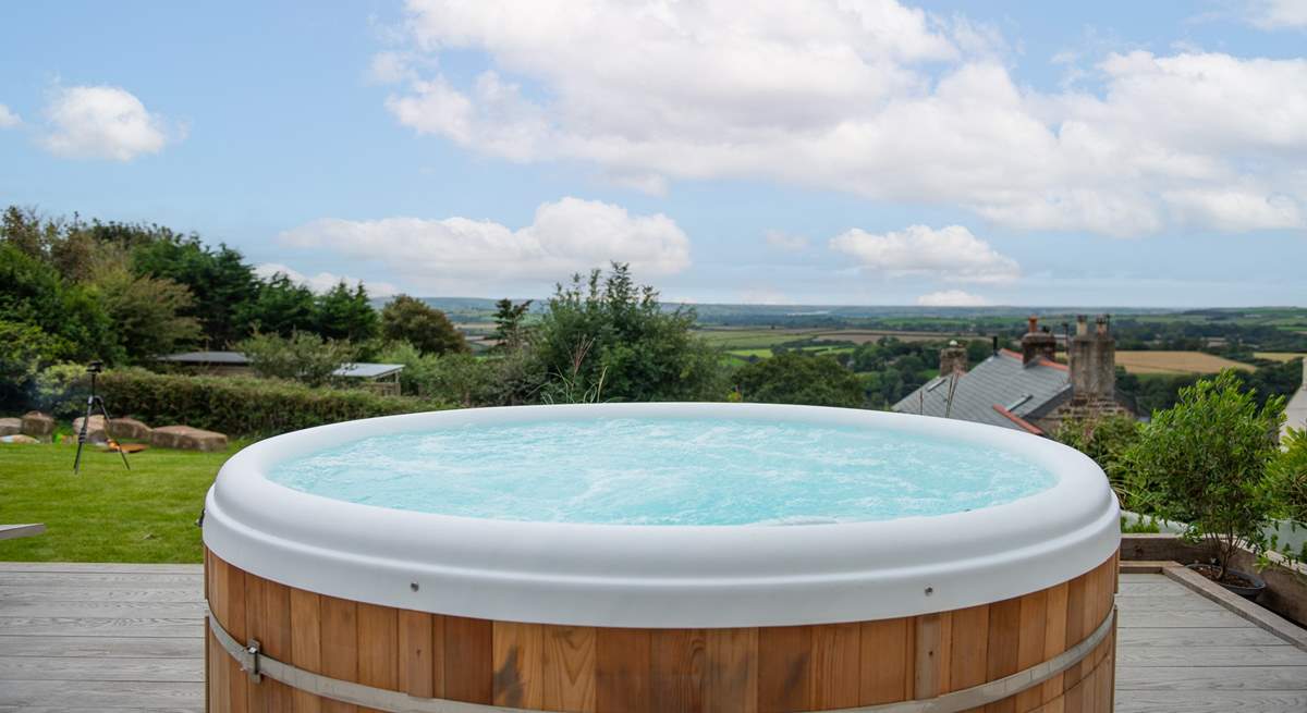 Soak in those panoramic views from the hot tub - what a treat.