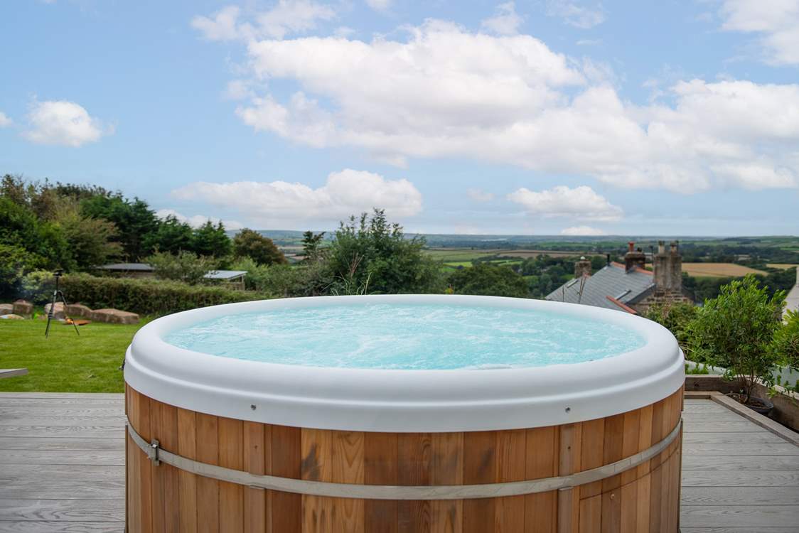 Soak in those panoramic views from the hot tub - what a treat.