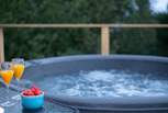 There's even a bubbling hot tub waiting for your arrival...