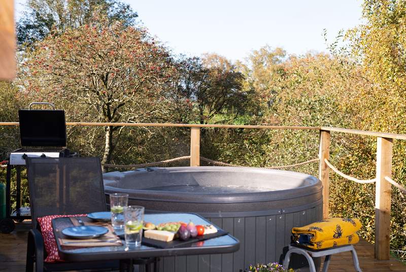 There's even a bubbling hot tub waiting for your arrival...