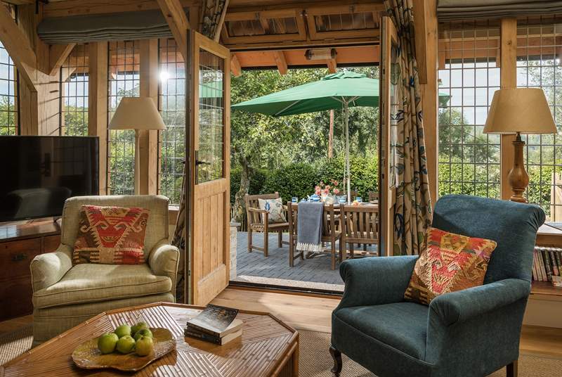 The beautiful oak framed garden-room, with an Arts and Crafts styled interior.