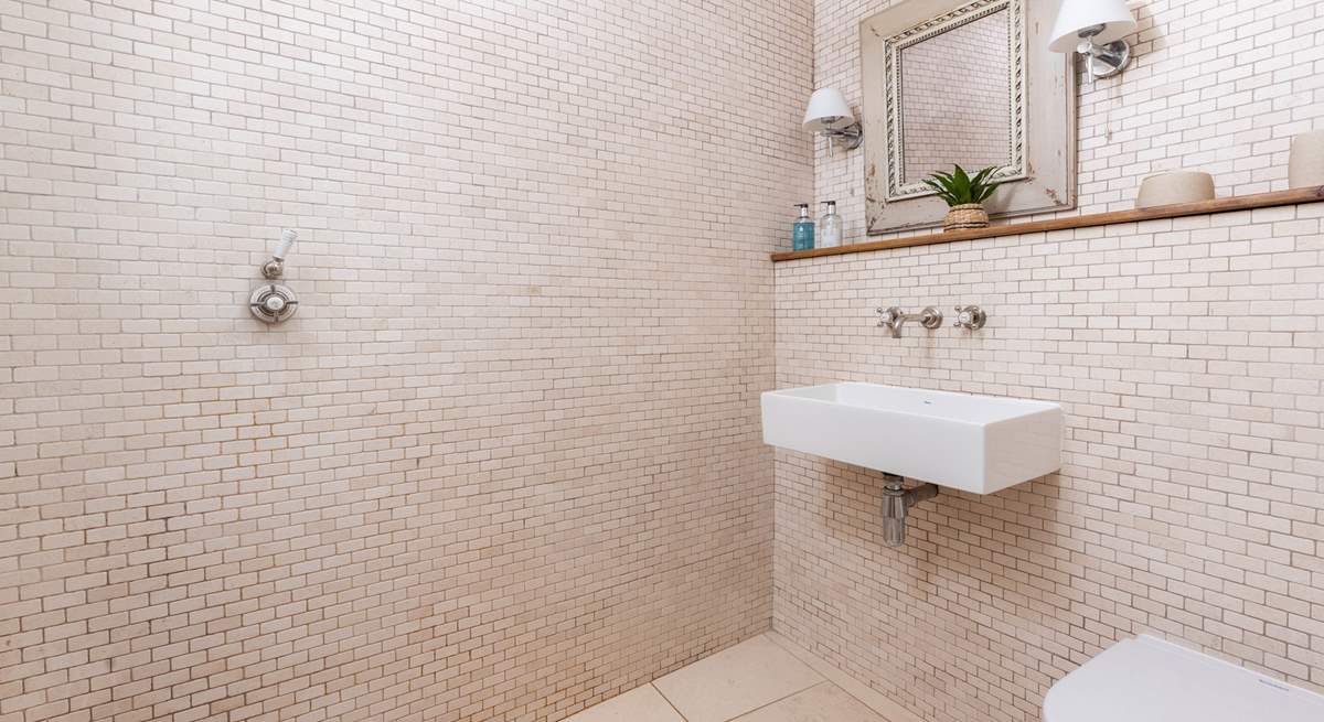 The wet-room is tiled throughout. 