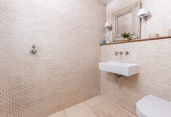 The wet-room is tiled throughout. 