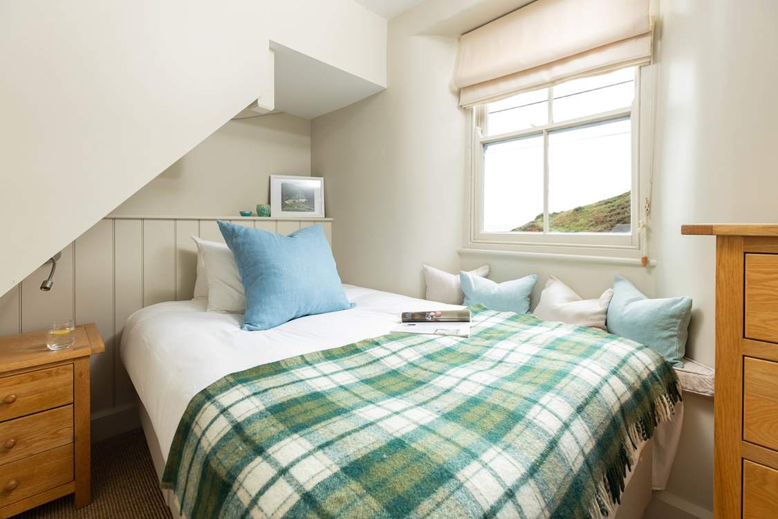 With luxury linens and a cosy throw.