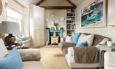 Take a seat by the wood-burner for cosy evenings.  - Thumbnail Image