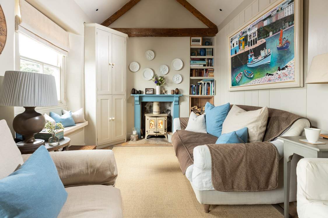 Take a seat by the wood-burner for cosy evenings. 