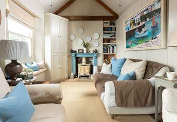 Take a seat by the wood-burner for cosy evenings. 