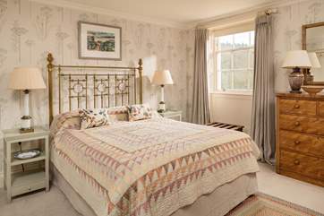 A wonderfully light and airy room, with a king-size bed and views over the surrounding countryside.