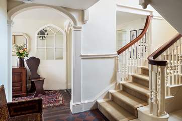 Head upstairs to the beautiful bedrooms.