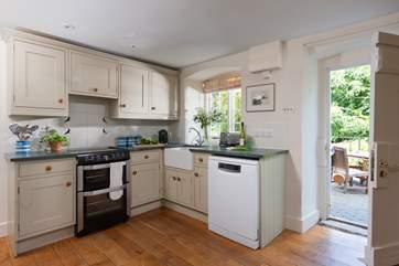 Traditional blue and white Cornishware complements the country-style kitchen.