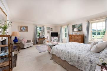 The large windows perfectly frame the glorious views of the surrounding countryside.