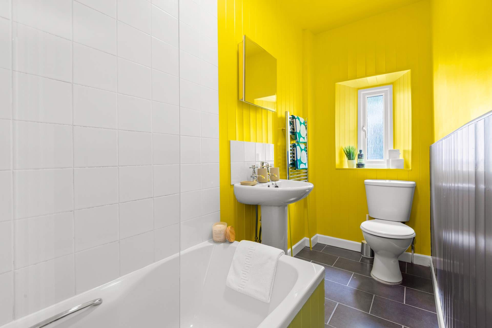 The family bathroom is fully equipped with a bath and power shower.