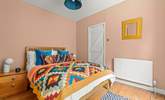 Bedroom 2 is super comfortable and cheerful. - Thumbnail Image