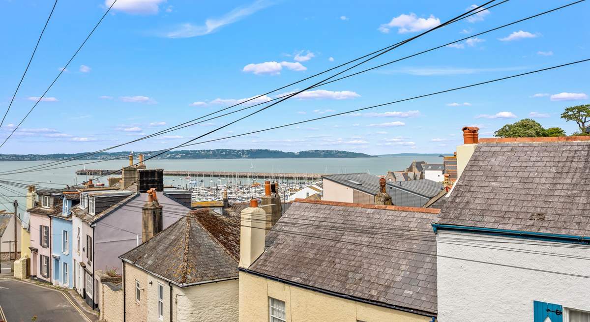 The view from your external seating-area, down to the harbour and out to sea. You are so close to the harbour, you can almost touch it.