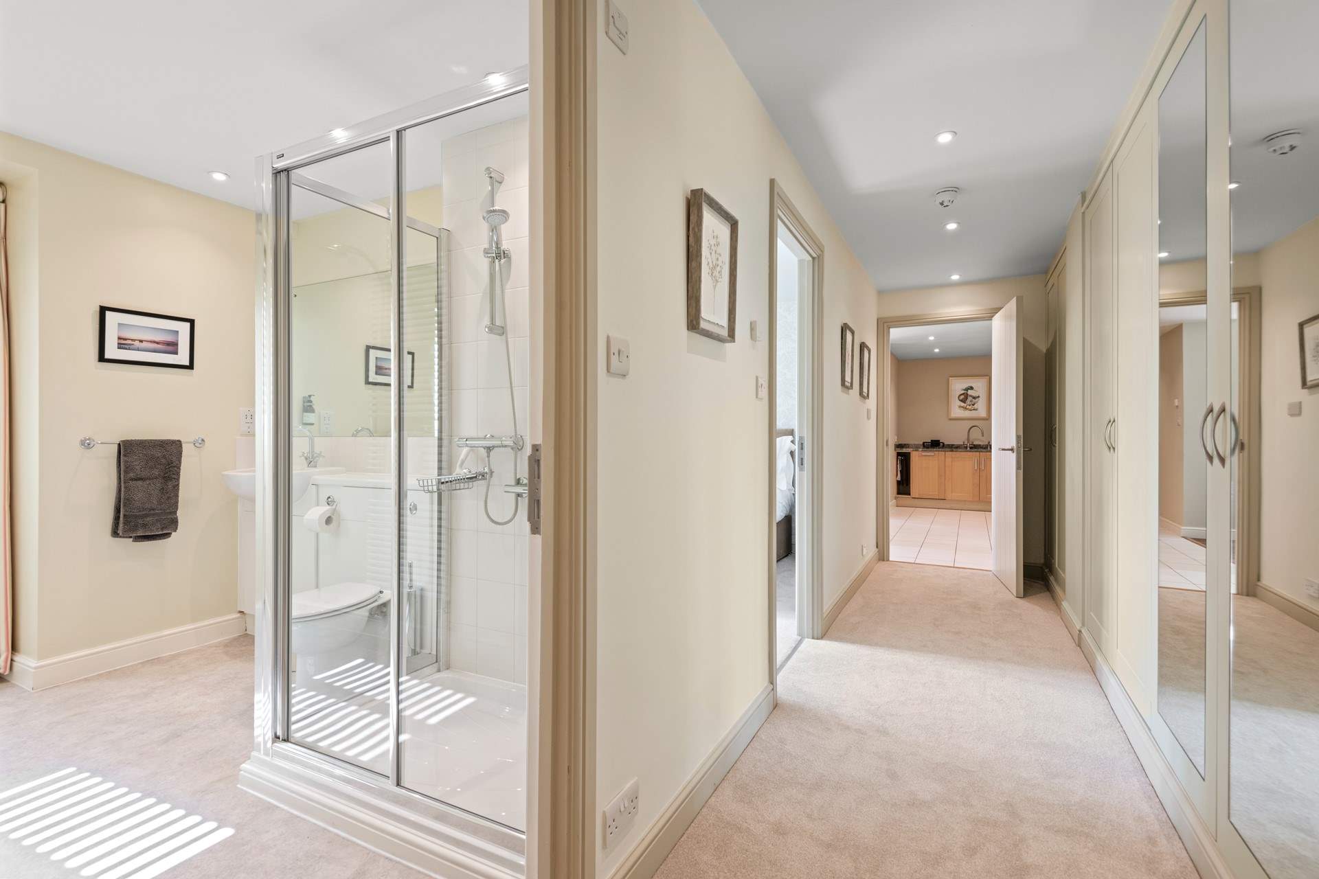 Next to the bedroom is the stylish shower-room.