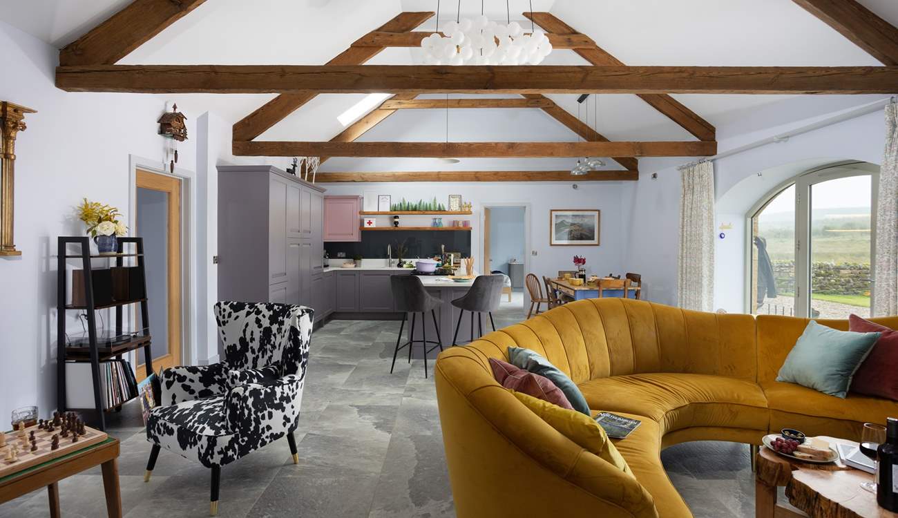 The cheerful open plan living area is enough to make anyone smile.