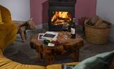 Stoke up the fire, pour a glass of wine and pull up the cute 'cow' side table. - Thumbnail Image