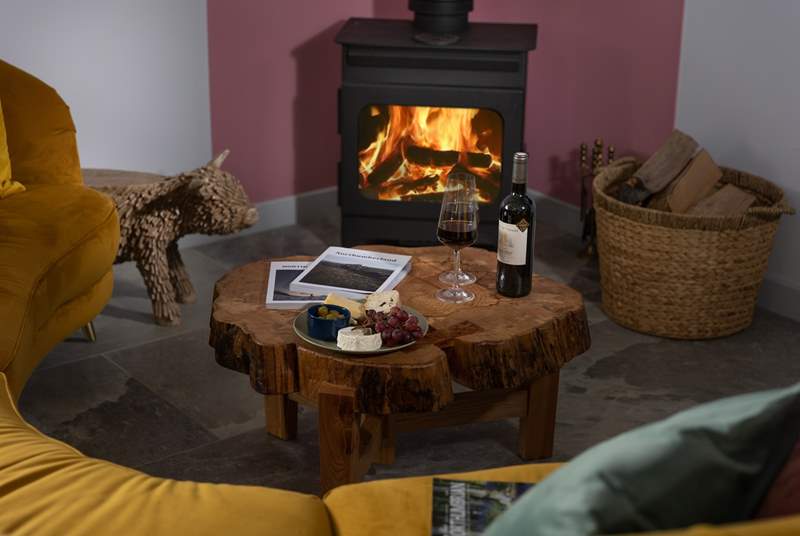 Stoke up the fire, pour a glass of wine and pull up the cute 'cow' side table.