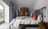 Stylish 1920's inspired design takes centre stage in this gorgeous king-size bedroom - Thumbnail Image