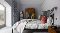 Stylish 1920's inspired design takes centre stage in this gorgeous king-size bedroom
