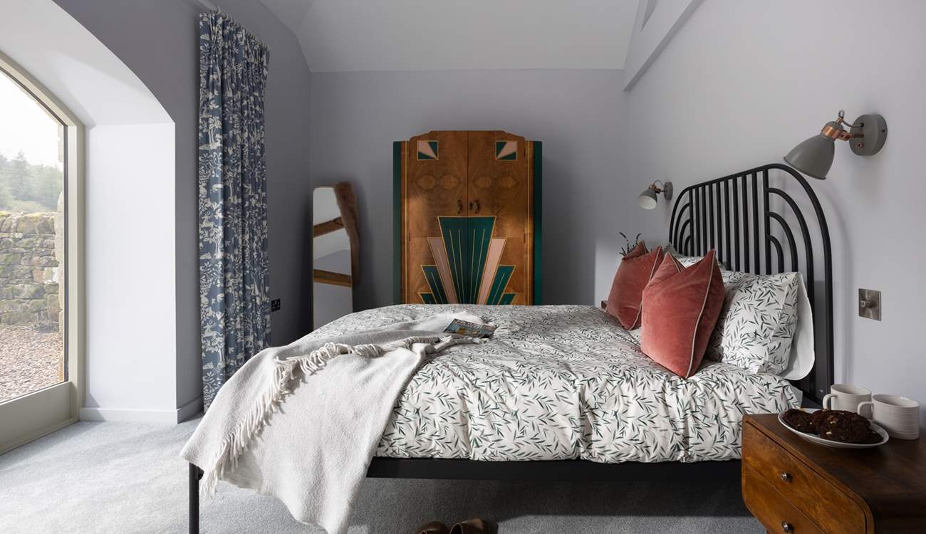 Stylish 1920's inspired design takes centre stage in this gorgeous king-size bedroom