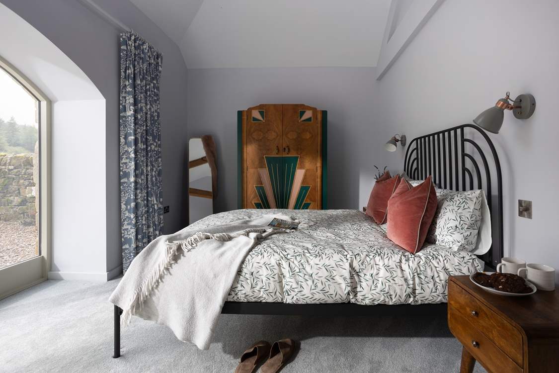 Stylish 1920's inspired design takes centre stage in this gorgeous king-size bedroom