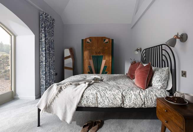 Stylish 1920's inspired design takes centre stage in this gorgeous king-size bedroom