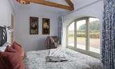 Original beams adorn bedroom 2. - Thumbnail Image