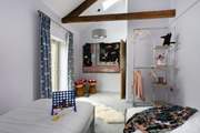 Designed for younger members of the party but perfect for anyone who appreciates the quirky styling of this twin bedroom.