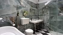A fantastically glamorous bathroom, take a shower or soak in the bath, you choose. 