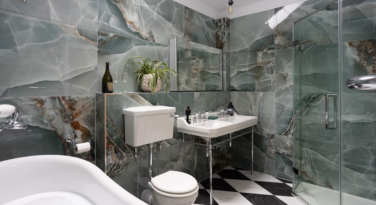 A fantastically glamorous bathroom, take a shower or soak in the bath, you choose. 