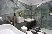 A fantastically glamorous bathroom, take a shower or soak in the bath, you choose.
