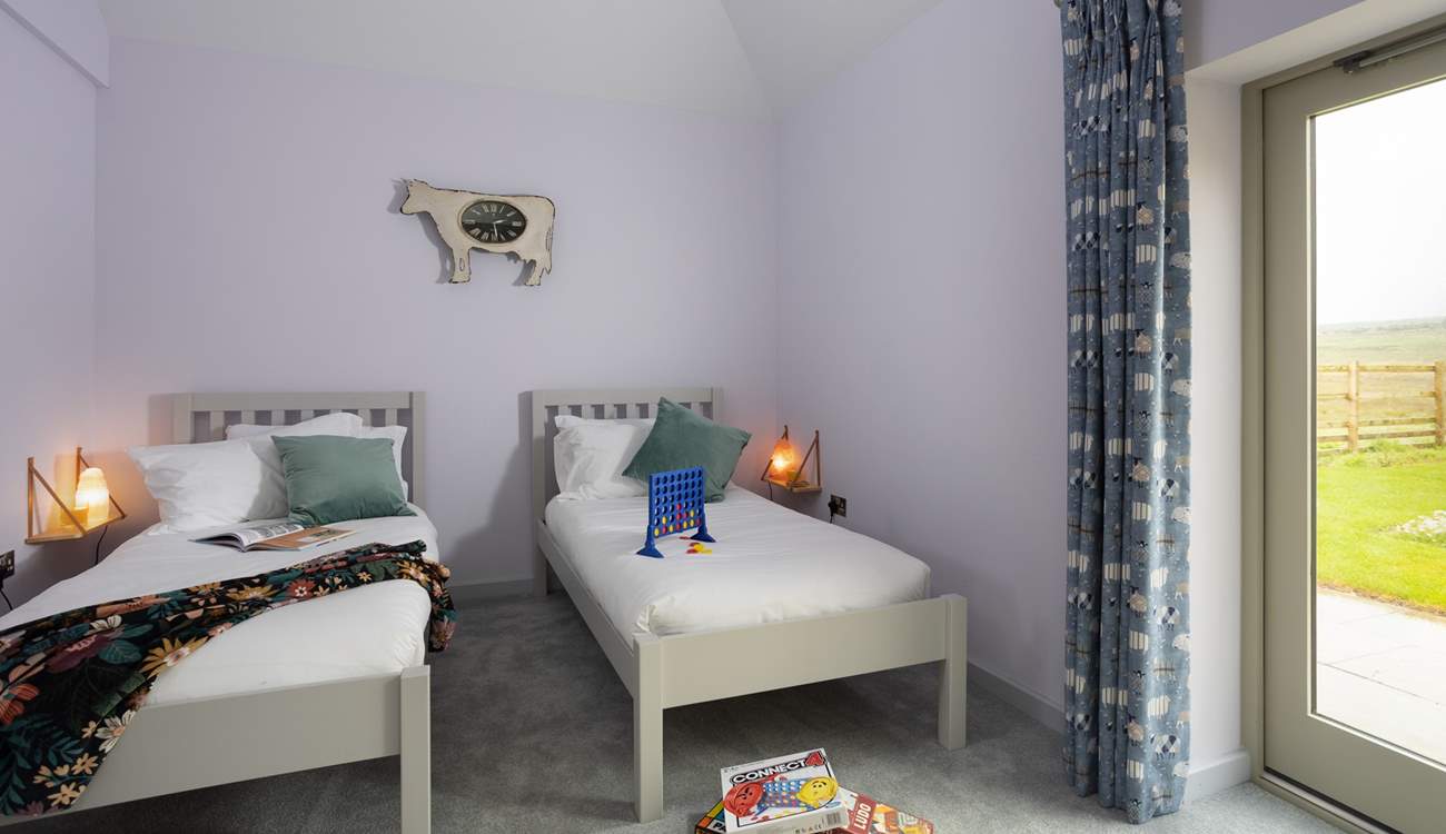 Himalayan salt lamps shine a light on your game playing or book reading but open the door and you find yourself in the rear garden with sheep peeping over the fence. 