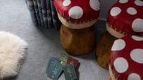 Perch on a mushroom stool and deal the cards. 