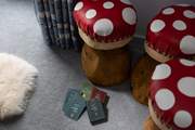 Perch on a mushroom stool and deal the cards.