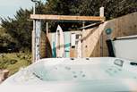 There's a bubbling hot tub and an al fresco shower for magical moments under starlight. 