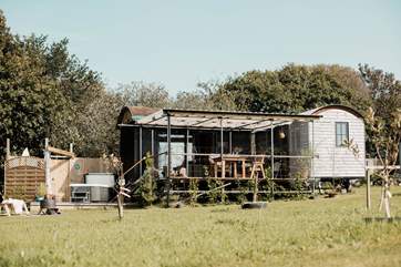 Such a unique design - the cabin hosts the kitchen, living area and shower-room, whilst the shepherd's hut (on the right) boasts a gorgeous bedroom.