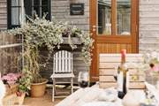 Gorgeous plants and pretty flowers encompass Birdsong.