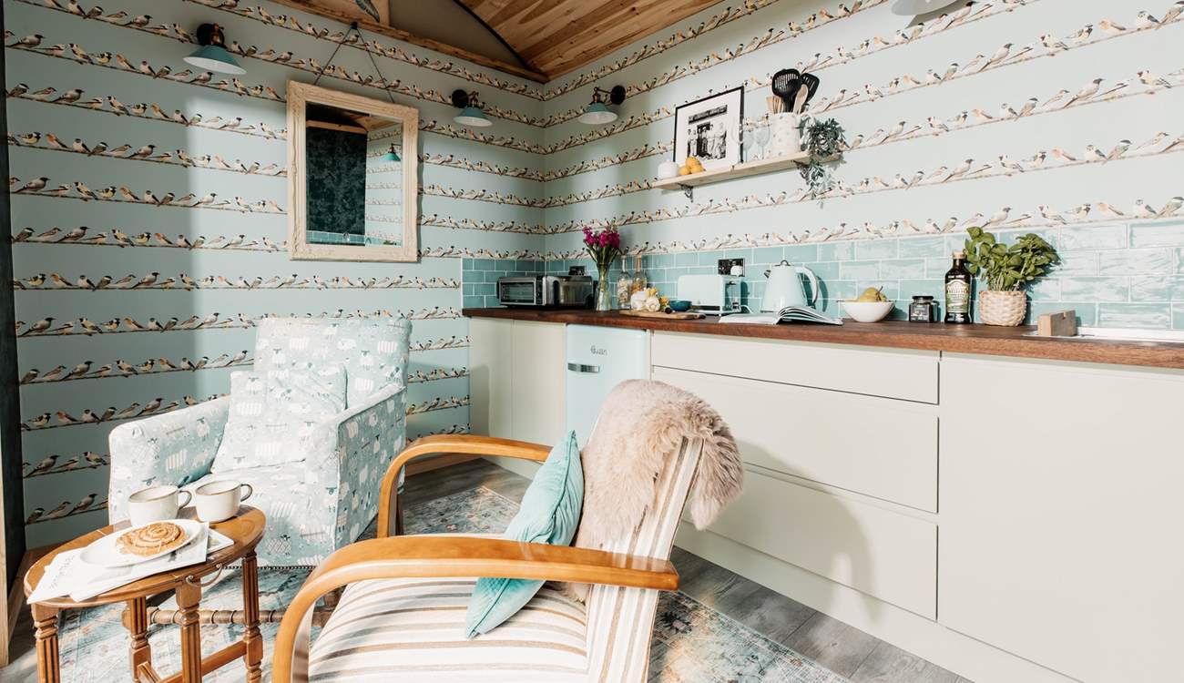 The lovely kitchen is well-equipped with everything you'll need during your stay. There's even a Ninja Foodi that has eight different cooking functions, including air frying, grilling and toasting. 