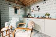 The lovely kitchen is well-equipped with everything you'll need during your stay. There's even a Ninja Foodi that has eight different cooking functions, including air frying, grilling and toasting.