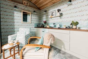 The lovely kitchen is well-equipped with everything you'll need during your stay. There's even a Ninja Foodi that has eight different cooking functions, including air frying, grilling and toasting.